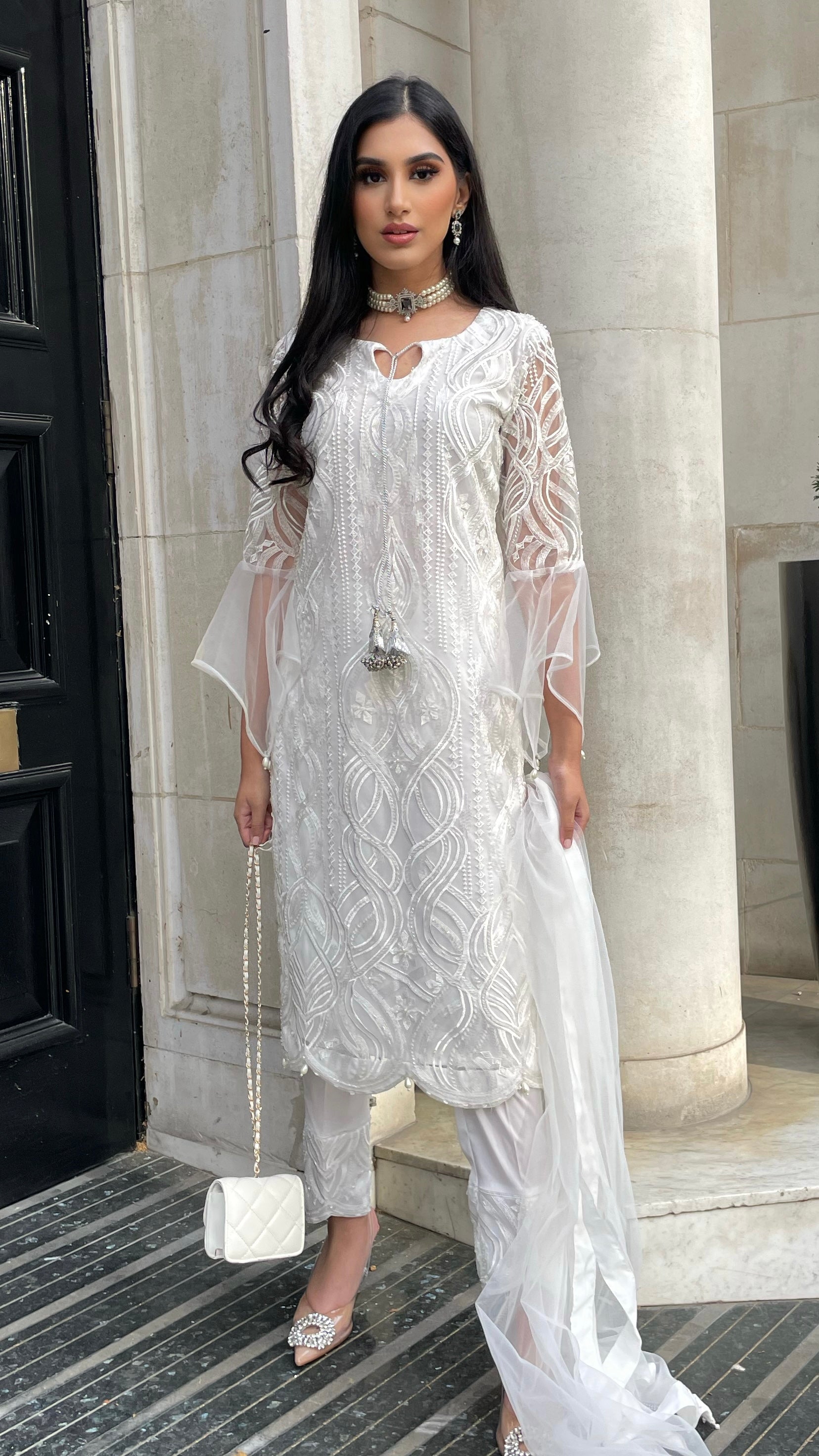 white net dress design images Grace meets glamour!, Beautiful off-white net gown with heavy embroidery work. Perfect for engagement, reception, cocktail party & special occasions., Premium quality fabric, Flared silhouette